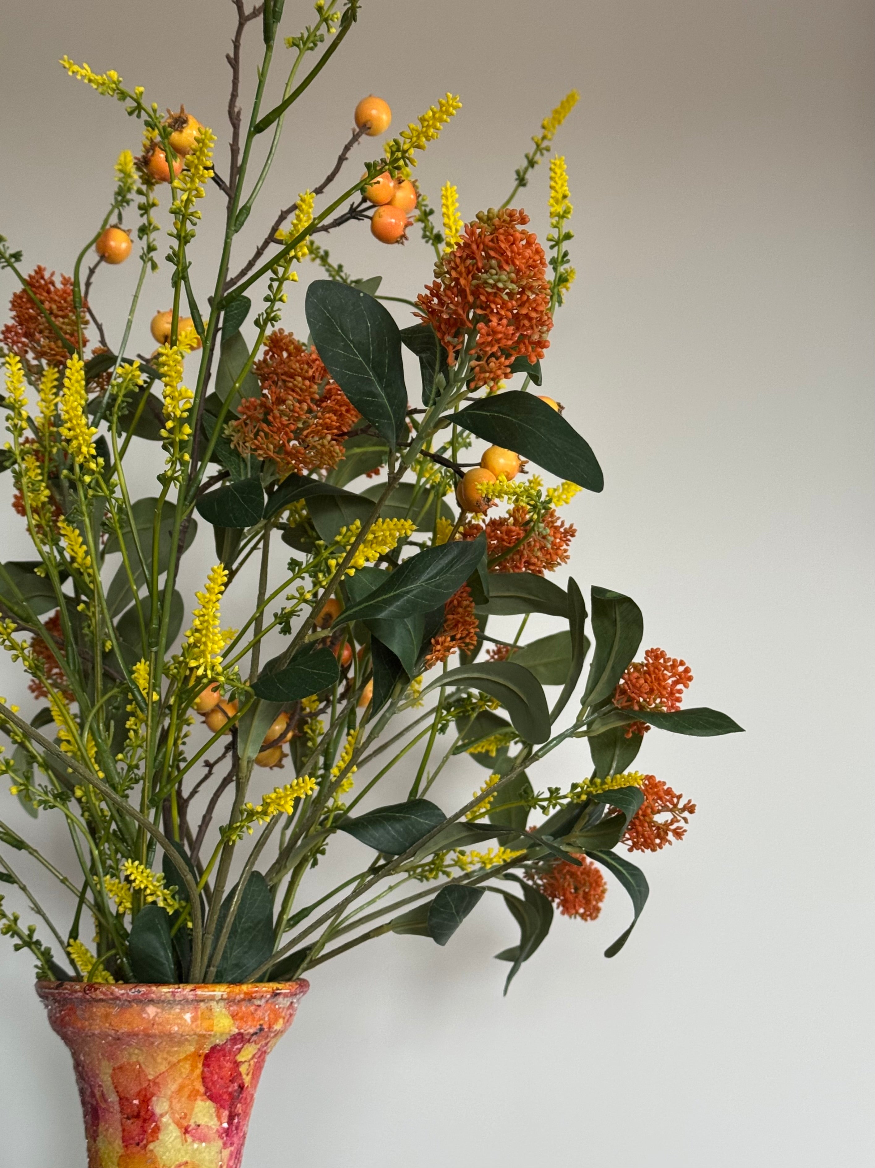 Accentkleur sunrise kunstbloemen vaas kussens close up kunstbloemen 2