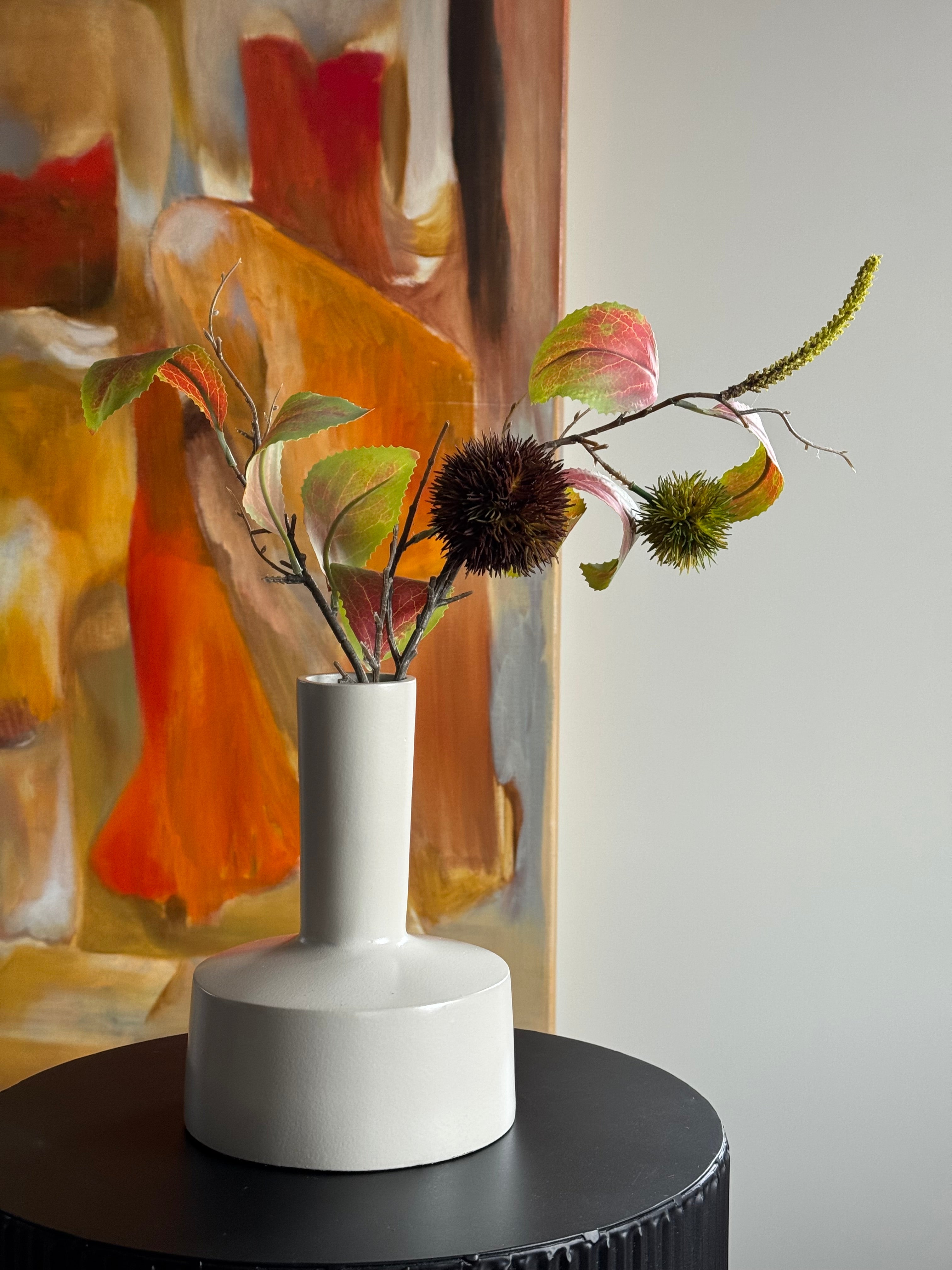 Ivory vaas met kastanje tak